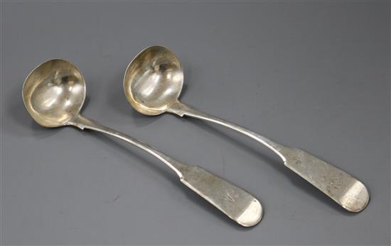 A pair of early Victorian Scottish provincial silver fiddle pattern sauce ladles by Pozzi & Stewart, Elgin, circa 1840, 16.3cm.